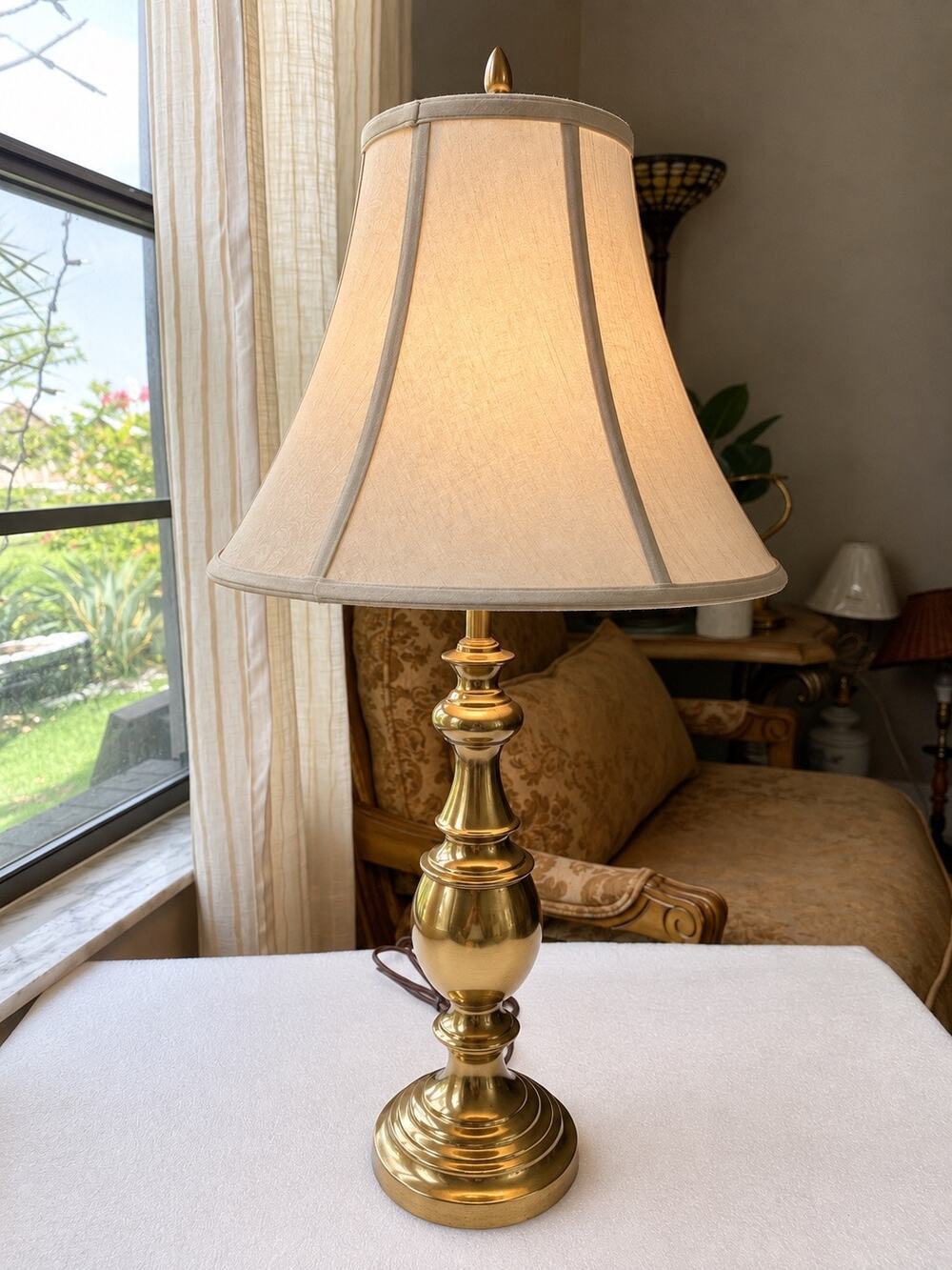 Antique Brass Table Lamp featuring a classic polished brass ivory bell shade